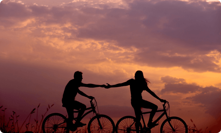 Couple biking silhouette